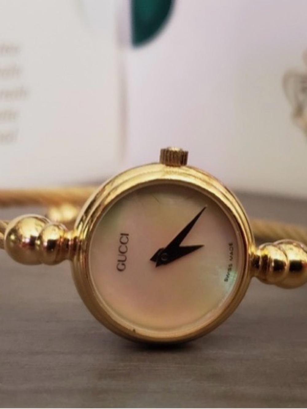 Gucci Gold-Tone Bangle Watch with Mother-of-Pearl Dial
